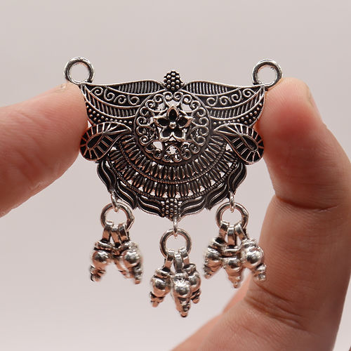 Antique Silver Pendant with Intricate Engravings