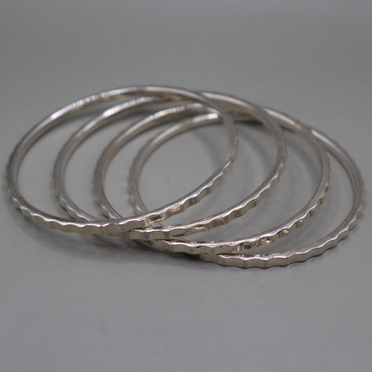 "Silver Glow Bangles"
